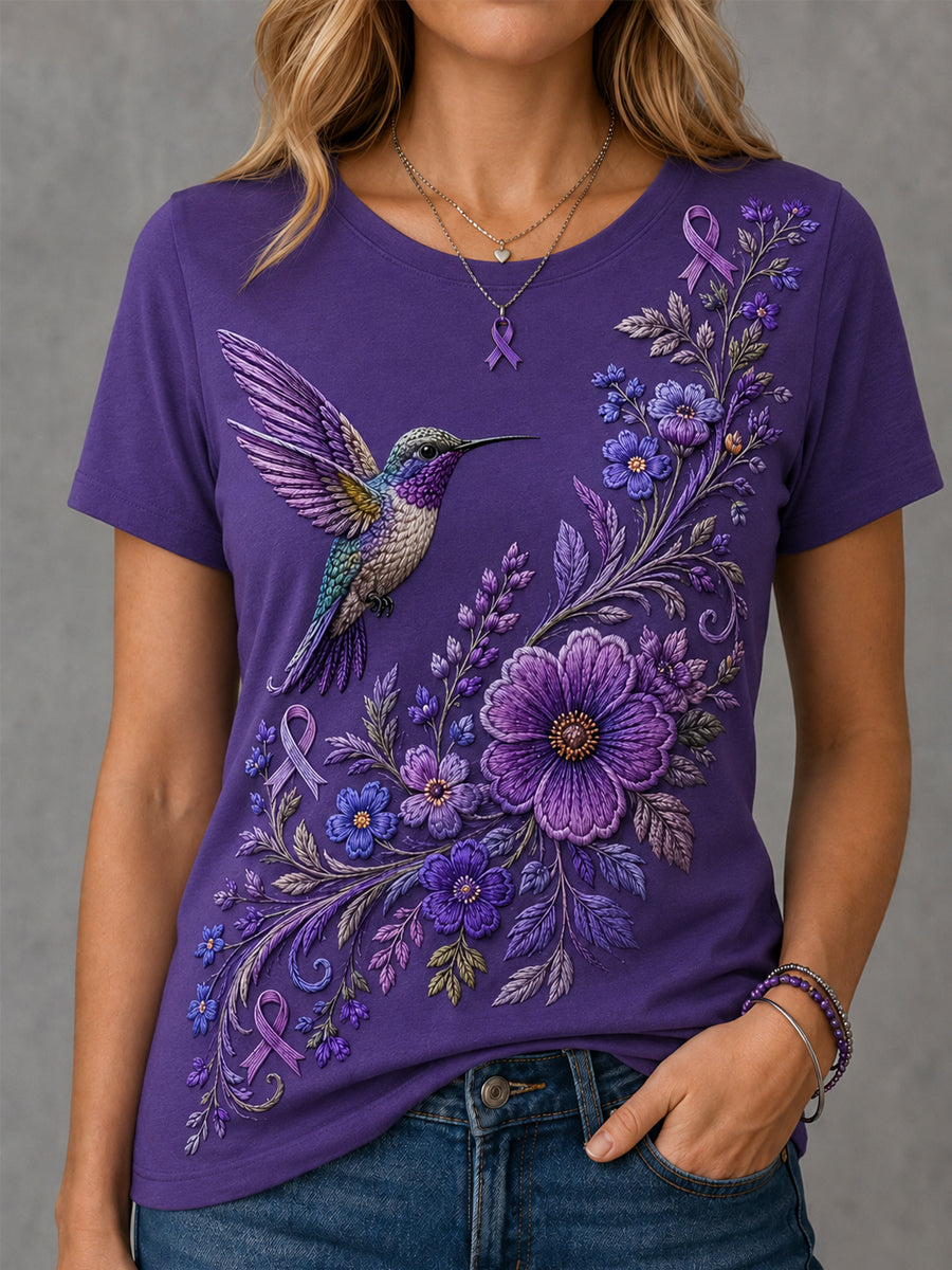 T-shirt de soutien violet à imprimé floral et colibri pour femmes