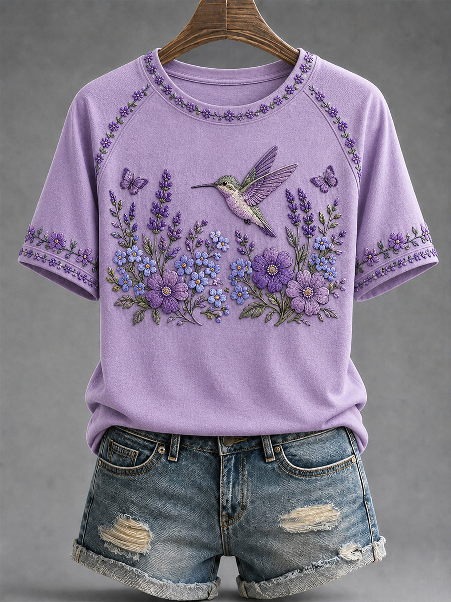 T-shirt de soutien violet à imprimé floral et colibri pour femmes