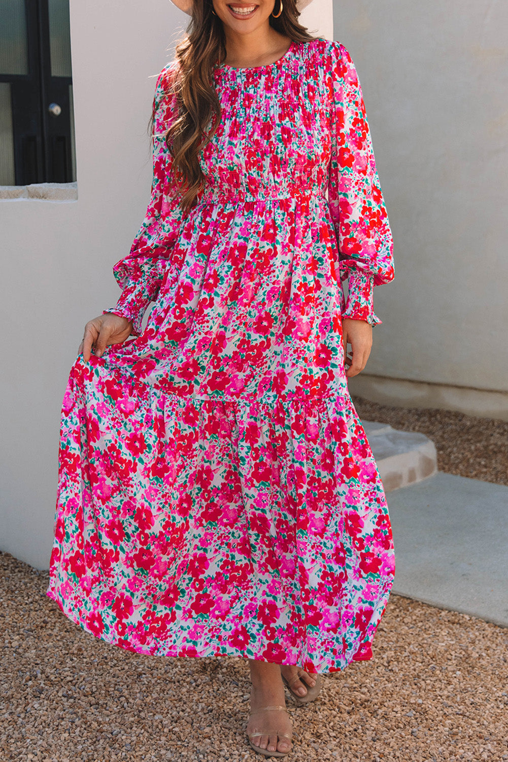 Robe longue bleu ciel à fleurs manches lanterne et taille smockée à volants