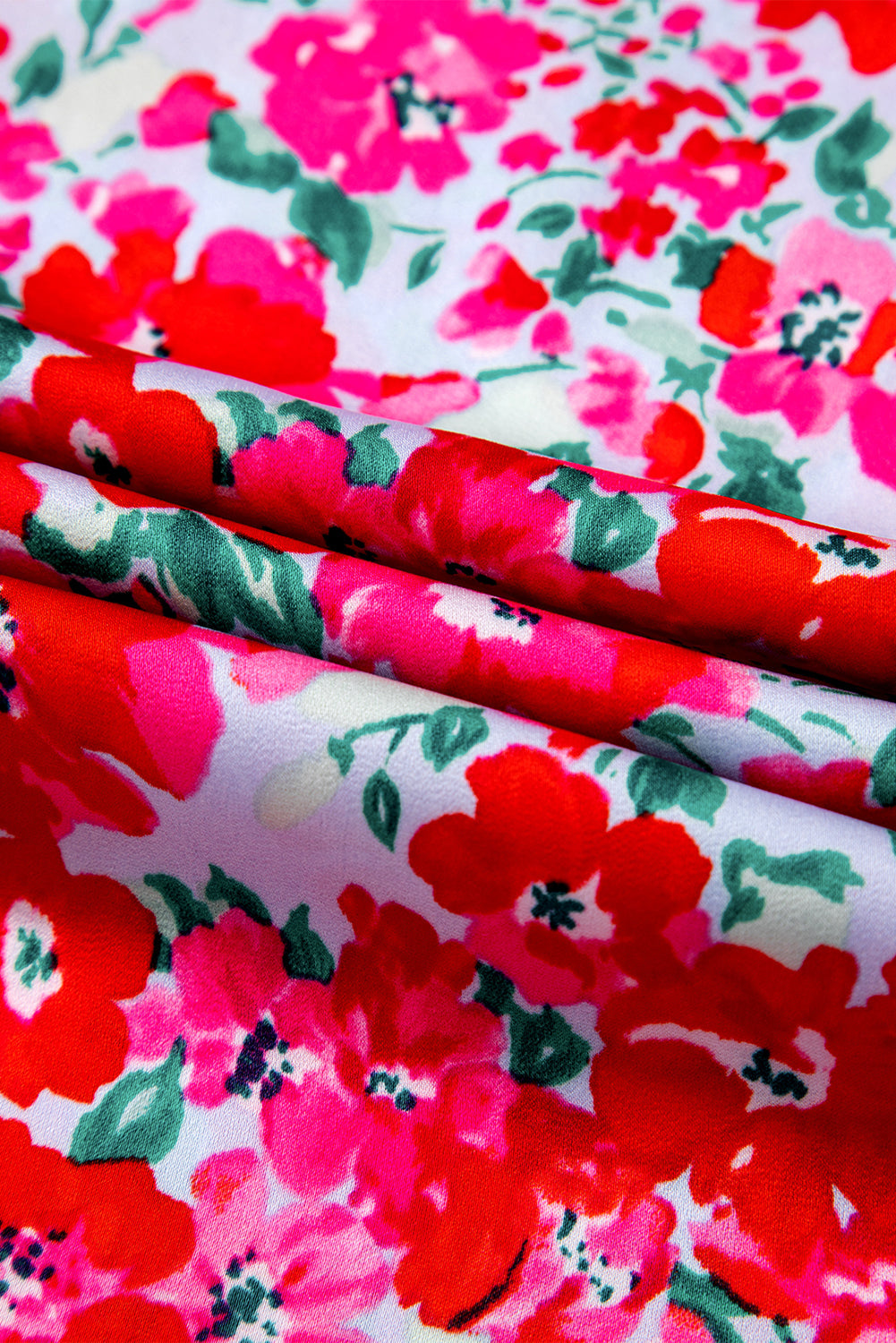 Robe longue bleu ciel à fleurs manches lanterne et taille smockée à volants
