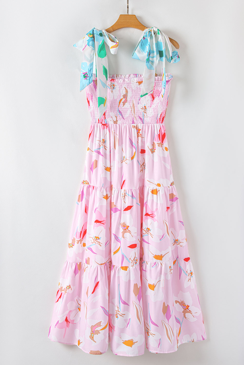 Robe longue smockée à épaules nouées imprimé floral rose