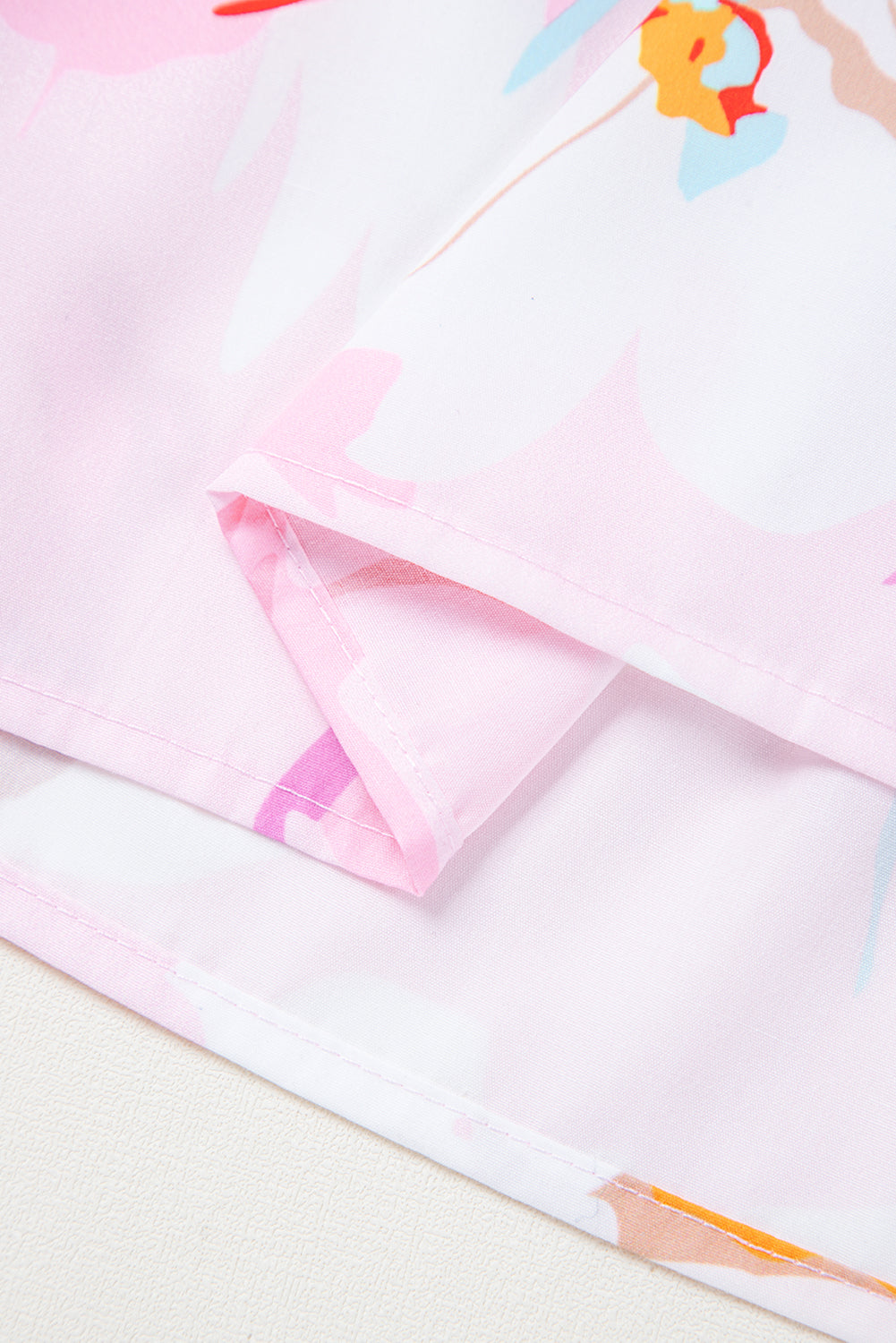Robe longue smockée à épaules nouées imprimé floral rose