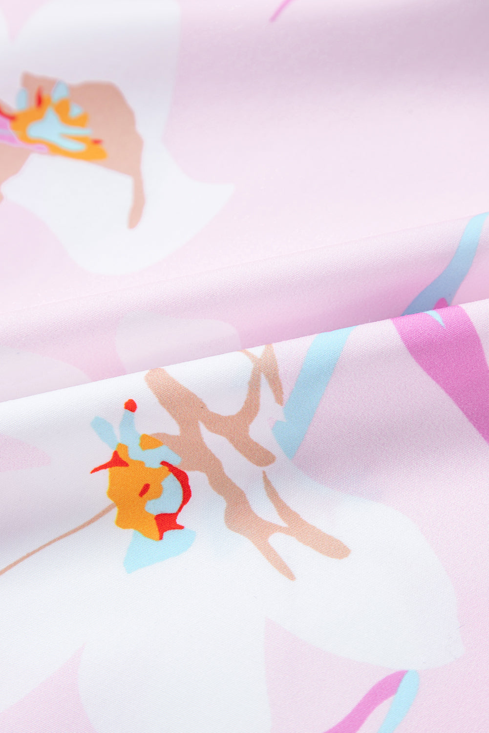 Robe longue smockée à épaules nouées imprimé floral rose