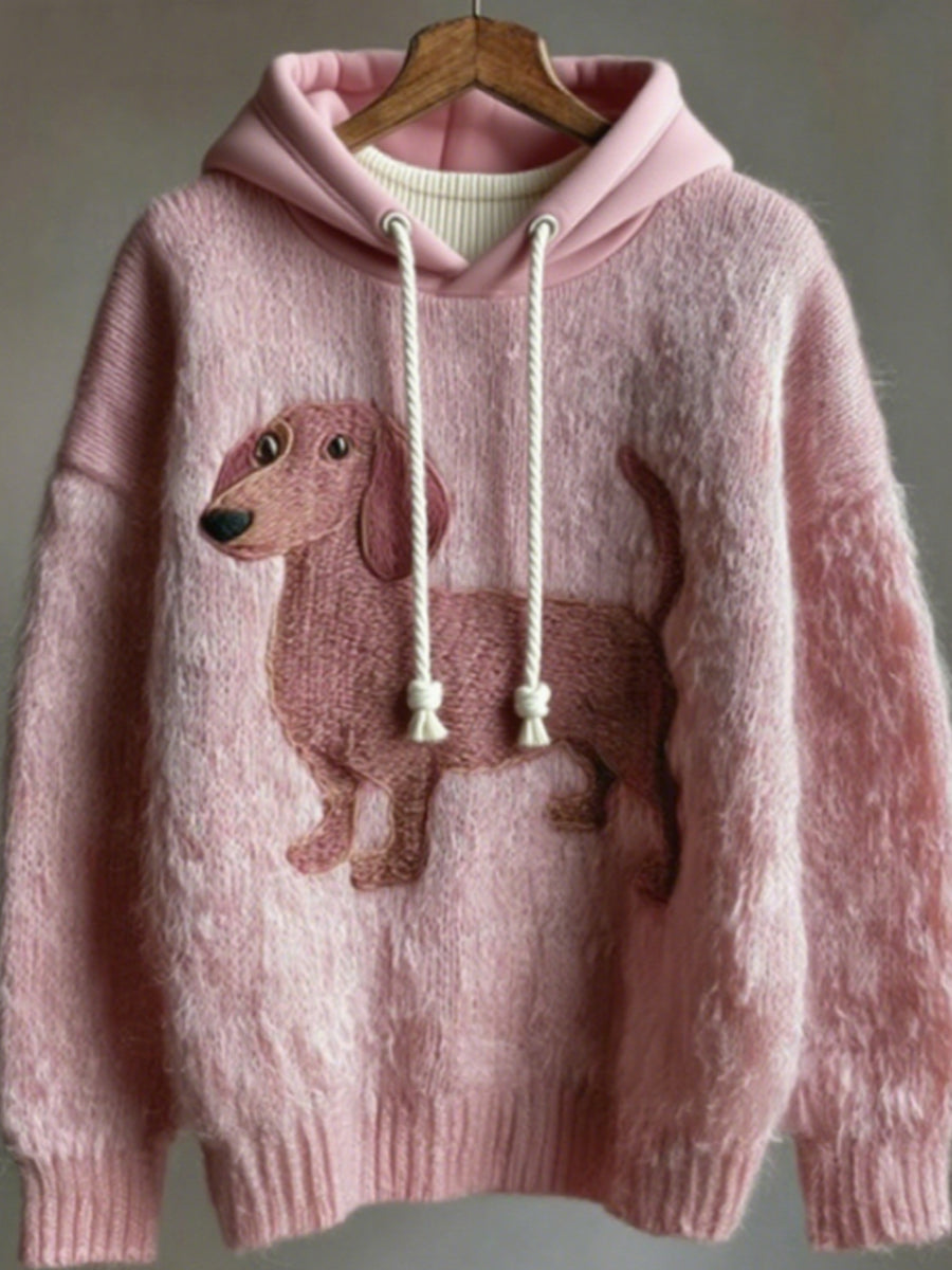 Le teckel rose des femmes a brodé le chandail surdimensionné tricoté confortable de peluche