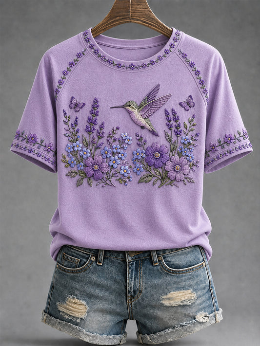 T-shirt de soutien violet à imprimé floral et colibri pour femmes